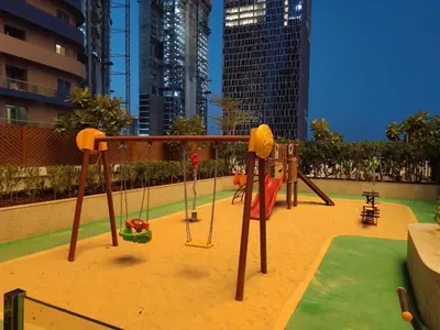 a playground in a city with tall buildings at RH- Modern Comfort & bright 1BR near Dubai Mall, City Views in Dubai