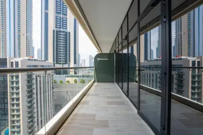 a balcony in a skyscraper with views of the city at RH- Modern Comfort & bright 1BR near Dubai Mall, City Views in Dubai
