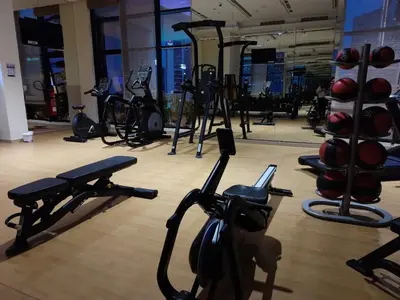 a gym with many exercise bikes in a room at RH- A Stylish Home Away from Home, Spacious 02 BR near Dubai Mall in Dubai