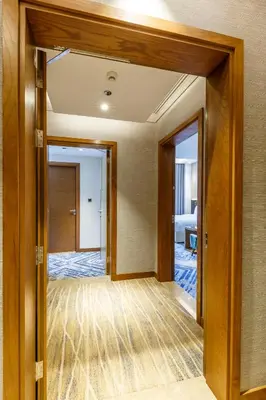 an open door into a room with a bedroom at S19 Hotel-Al Jaddaf Metro Station in Dubai
