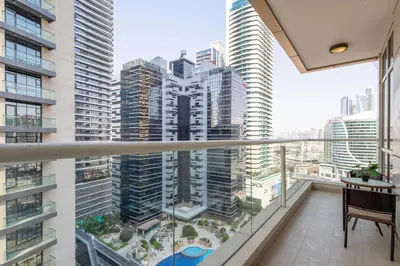 an apartment balcony with a view of a city at Frank Porter - Mon Reve in Dubai