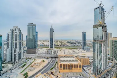 a view of a city with tall buildings at Breathtaking City Views From DT Apt with Terrace in Dubai