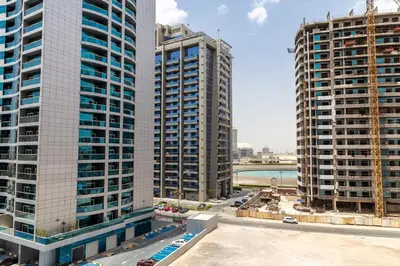 a view of two tall buildings in a city at Frank Porter - The Medalist in Dubai