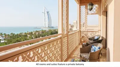 an empty balcony with a view of the ocean at Jumeirah Al Qasr Dubai in Dubai