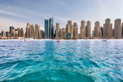 a view of a city from a body of water at Hilton Dubai Jumeirah in Dubai