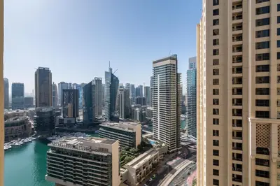 an aerial view of a city with tall buildings at The Smart Concierge - Bahar 6 in Dubai