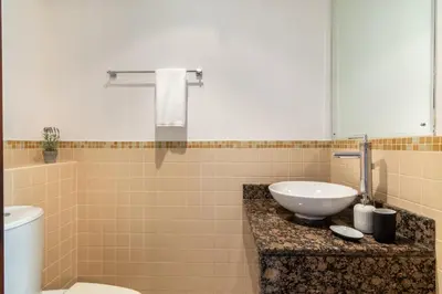 a bathroom with a sink and a toilet at The Smart Concierge - Bahar 6 in Dubai