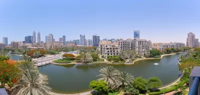 a view of a river with a city in the background at RH - Beautiful canal view, Sleek & spacious Studio, central location in Dubai