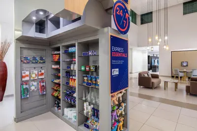 a pharmacy aisle with a pharmacyacistacistacistacistventoryventory at Holiday Inn Express Dubai, Jumeirah by IHG in Dubai