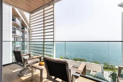 a balcony with a view of the ocean at GuestReady - The Best Bluewaters View in Dubai