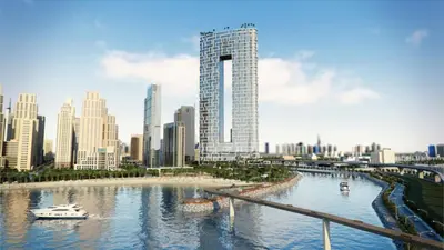 a rendering of a city with a river and buildings at Modern 1BR Oasis in Prime Location, Book Now by Deluxe Holiday Homes in Dubai