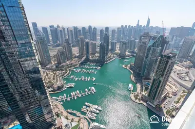 a view of a harbor in a city with boats at Dream Inn - Damac Heights by Fendi in Dubai