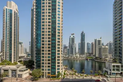 a city with tall buildings and a body of water at Frank Porter - Murjan 6 in Dubai
