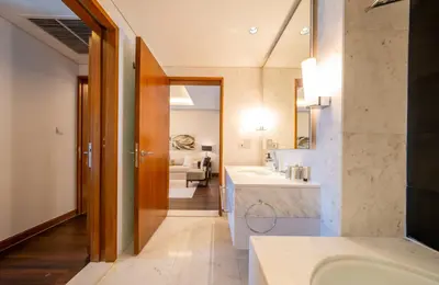 a bathroom with a tub and a sink at New Arabian -Address Emaar Fashion Avenue in Dubai