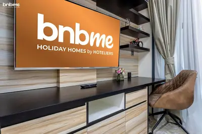 a sign for a home office with a desk at bnbmehomes - Merano Tower in Dubai