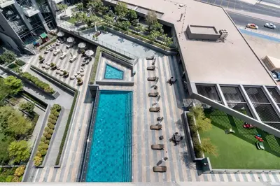 an overhead view of a swimming pool on a building at EDEN'S Homes & Villas - Atria Residences in Dubai