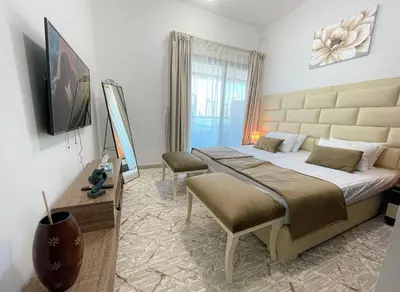 a bedroom with a large bed in a room at Private gorgeous Room with Marina view with Shared Kitchen in Shared Apartment in Dubai