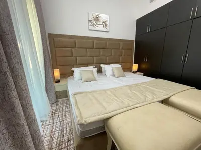 a bedroom with two beds and a large window at Private gorgeous Room with Marina view with Shared Kitchen in Shared Apartment in Dubai
