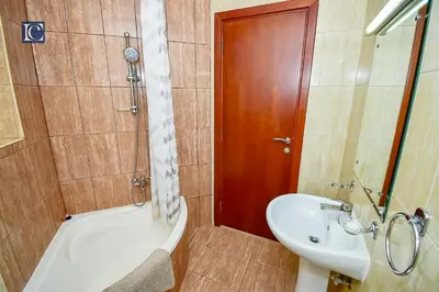 a bathroom with a tub and a sink and a shower at Luxury Escapes - Budget Cozy Studio in Dubai Gate 2 JLT in Dubai