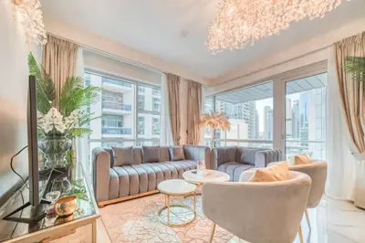 a living room with a couch and a table at Classy 2BR at La Riviera Dubai Marina by Deluxe Holiday Homes in Dubai