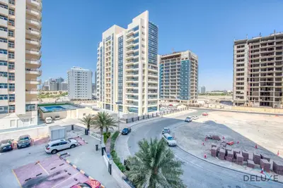 an aerial view of a city with tall buildings at Radiant Studio at Giovanni Boutique Suites DSC by Deluxe Holiday Homes in Dubai