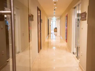 a hallway in a building with a long corridor at Holidays R Us villa 3 bedroom premium location in Dubai
