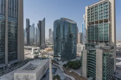 an aerial view of a city with tall buildings at HiGuests - Luxury Apartment in the Iconic Park Towers in Dubai