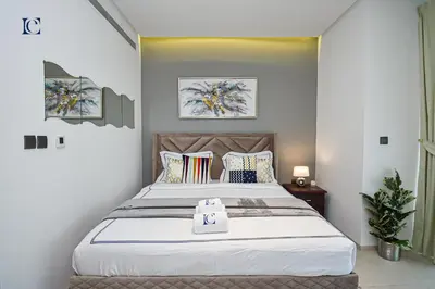 a bedroom with a large bed in a room at Luxury Escapes - Large Studio in the heart of Dubai Marina - West Avenue in Dubai