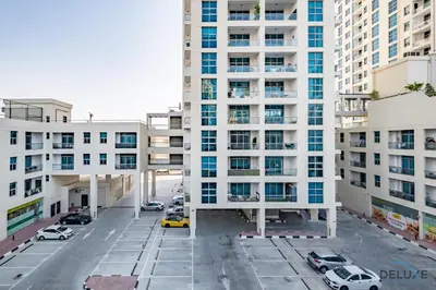 an aerial view of a parking lot in front of buildings at Captivating 1BR at DEC Towers Dubai Marina by Deluxe Holiday Homes in Dubai