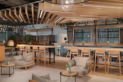a rendering of a restaurant with chairs and a bar at Rove Expo City in Dubai