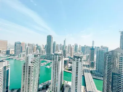 an aerial view of a city with tall buildings at Apartments on JBR by HAPPY SEASON in Dubai