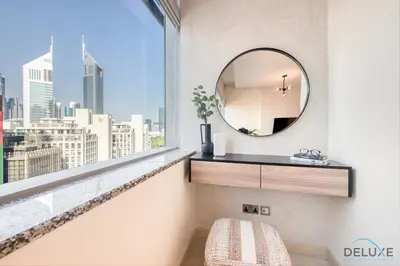 a bathroom with a mirror and a window at Special Rate Cozy Studio with Balcony Near Attractions by Deluxe Holiday Homes in Dubai