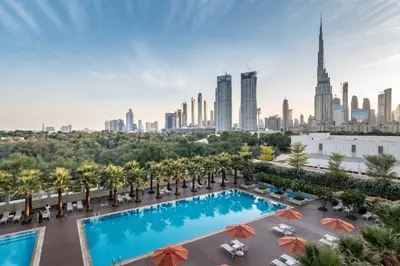 a view of the city from the rooftop pool at the shahi hotel at Silkhaus Modern Burj Khalifa View Studio in Dubai