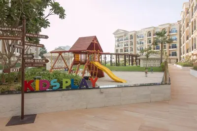 a park with a slide and a playground at Fully Furnished Studio, Ready to Move-in! Resortz 19 in Dubai