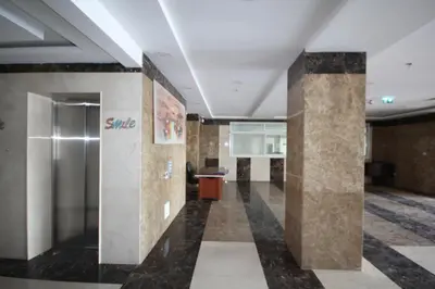 a lobby with a silver elevator in a building at Special Offer Studio for Rent in Dubai in Dubai