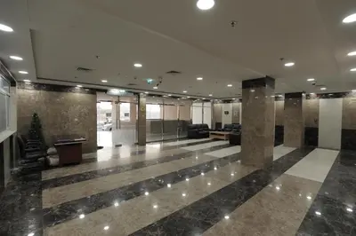 a lobby of a building with a large lobby at Special Offer Studio for Rent in Dubai in Dubai