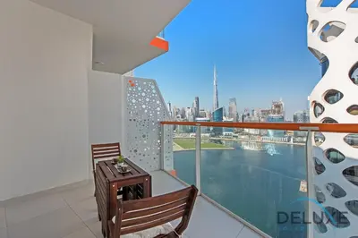 a balcony with a view of the city at Intimate Studio at Millennium Binghatti Residence Business Bay by Deluxe Holiday Homes in Dubai