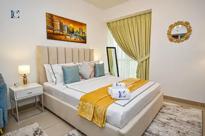 a bedroom with a large bed in a room at Luxury Escapes - Cozy Studio - Goldcrest Executives JLT in Dubai