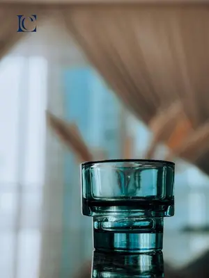 a glass vase sitting on top of a table at Luxury Escapes - Marina Views 1BR Apartments - Bay Central Dubai Marina in Dubai