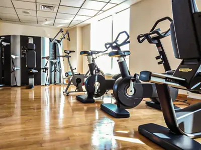 a gym with several exercise bikes in a room at Luxury Escapes - Marina Views 1BR Apartments - Bay Central Dubai Marina in Dubai