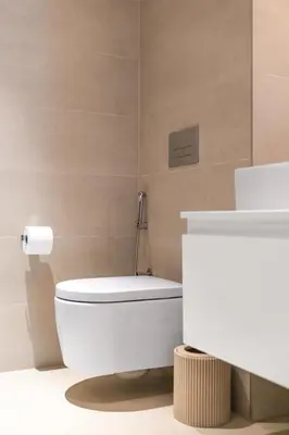 a bathroom with a white toilet and a sink at Most beautiful 3 BR apt in BLUEWATERS ISLAND, DUBAI in Dubai