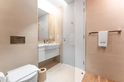 a bathroom with a toilet and a sink at Most beautiful 3 BR apt in BLUEWATERS ISLAND, DUBAI in Dubai