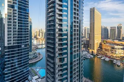 a view of a city with tall buildings and a river at Frank Porter - Bay Central in Dubai