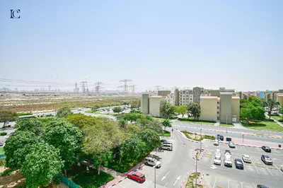 an aerial view of a parking lot with cars at Luxury Escapes - Tranquil Retreat - Studio Apts near Metro and Mall - Discovery Gardens - SHAR & MCL in Dubai