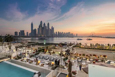 a view of the dubai skyline at sunset at FIVE Palm Jumeirah - 2 Bedrooms & Maid Room Apartment in a Splendid Resort in Dubai