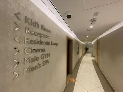 a hallway with writing on a wall in a hospital at DH58 - High end 1BR, Palm views in Damac Heights tower in Dubai