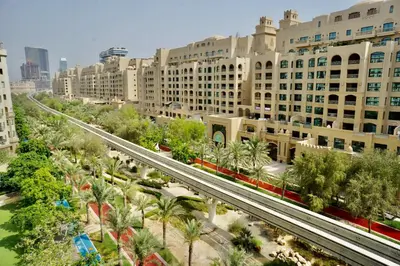 an aerial view of a city with buildings at Luxury Apartment Palm Jumeirah in Dubai