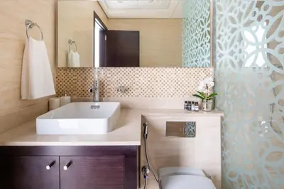 a bathroom with a sink and a toilet in it at Frank Porter - Mon Reve in Dubai