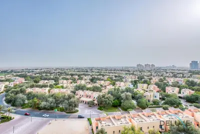 an aerial view of a city with buildings at Serene Studio in Elite Residences 4 Sports City by Deluxe Holiday Homes in Dubai