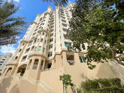 a large white building with stairs on it at Dreamy and Spacious 3BR Unique Palm Jumeirah in Dubai